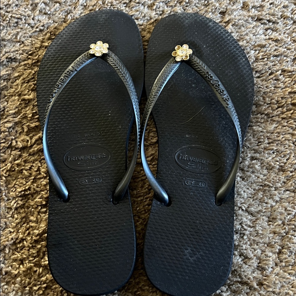 Havaianas Black Flip Flops with Gold Floral Detail